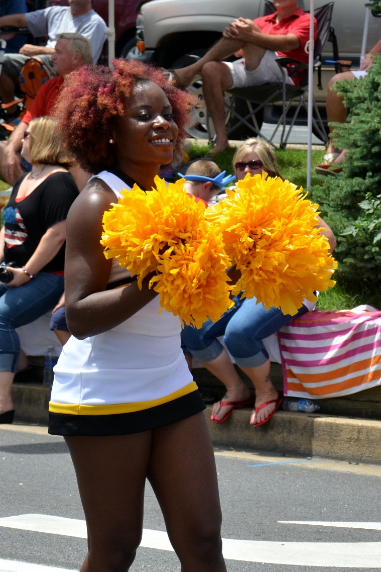 UMBC Cheerleader With Yellow Poms UMBC Cheerleader With Yellow Poms