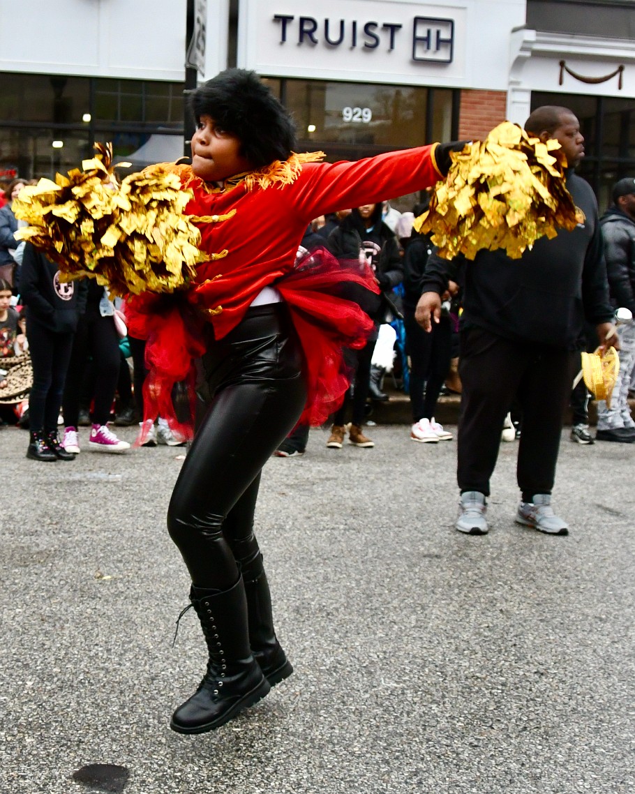 Outstretched With Gold Poms