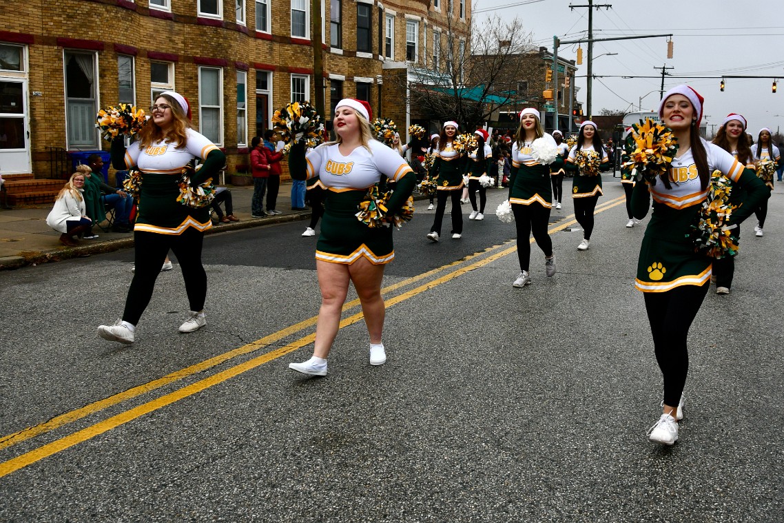 Catholic High Cheerleaders Marching In
